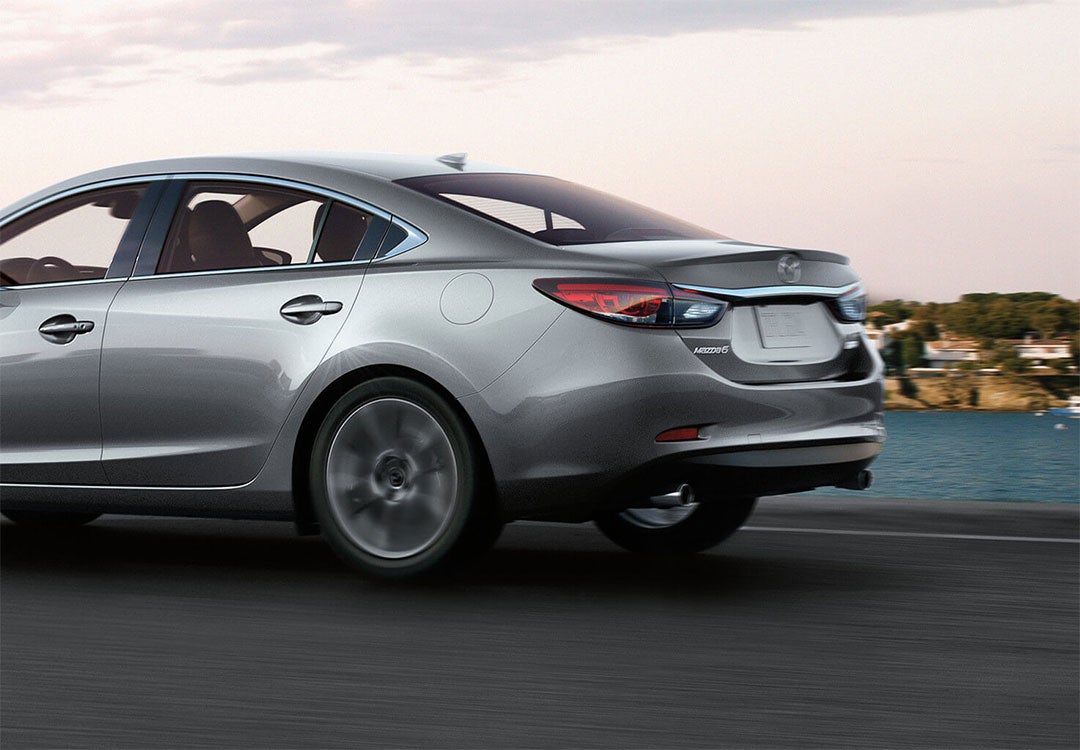 Mazda Certified Pre-Owned vehicle on the road